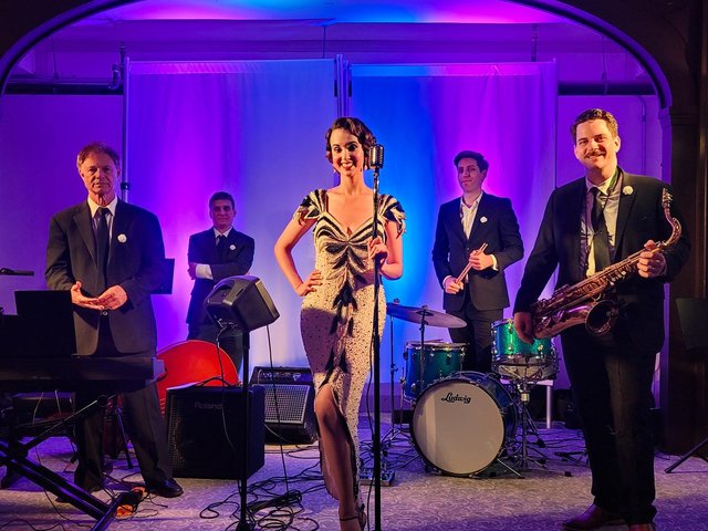 Beaded 1920s gown and a black-tie band under purple lights at The Charleston in Orange County